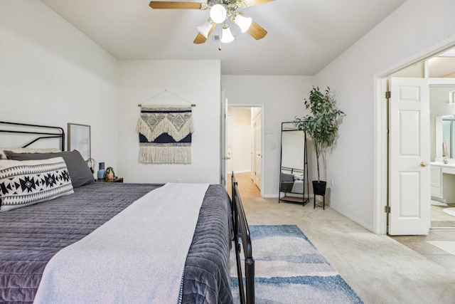 136 Trail Of The Flowers, Georgetown, TX 78633 - bedroom with carpet flooring, ensuite bathroom, and ceiling fan
