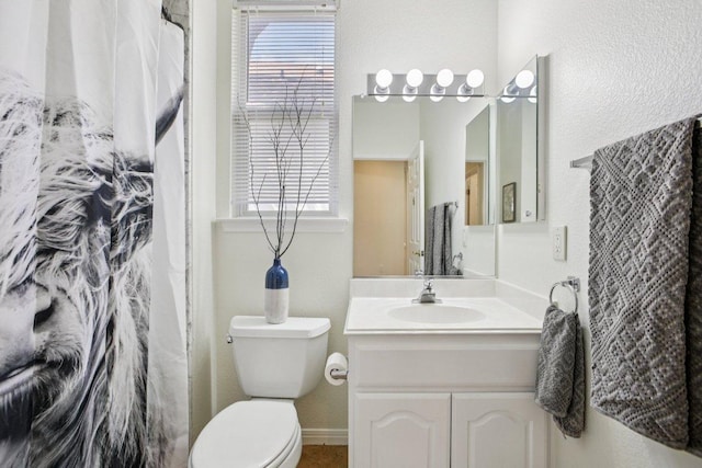 136 Trail Of The Flowers, Georgetown, TX 78633 - full bathroom featuring vanity, plenty of natural light, and a shower with curtain