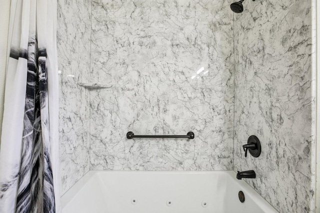 136 Trail Of The Flowers, Georgetown, TX 78633 - bathroom featuring a combined bath / shower with jetted tub