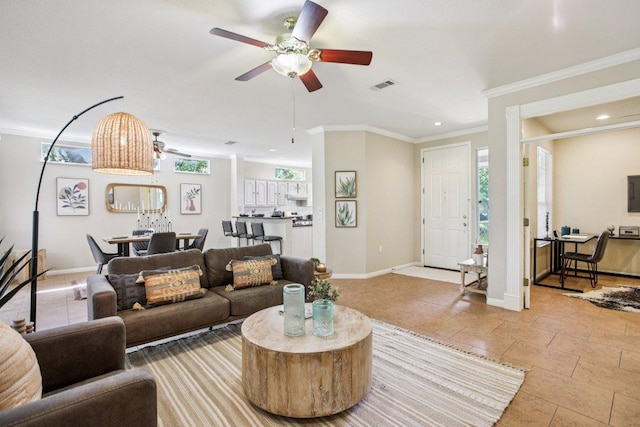 136 Trail Of The Flowers, Georgetown, TX 78633 - living room featuring crown molding, ceiling fan, recessed lighting, and tile patterned flooring