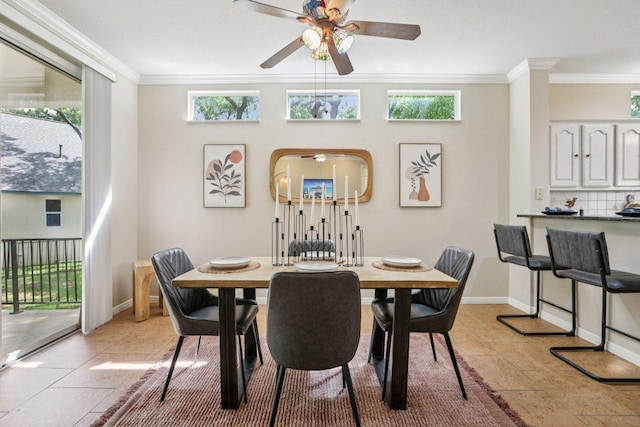 136 Trail Of The Flowers, Georgetown, TX 78633 - dining room with ornamental molding, ceiling fan, plenty of natural light, and light tile patterned floors