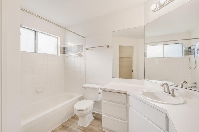 6000 Shepherd Mountain Cv Unit 1805, Austin, TX 78730 - bathroom with healthy amount of natural light, vanity, bathing tub / shower combination, and wood finished floors