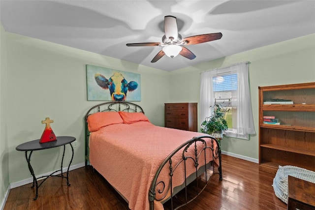 1200 County Road 149, Georgetown, TX 78626 - bedroom with wood finished floors and a ceiling fan