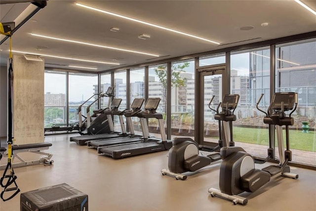 48 E Ave Unit 2707, Austin, TX 78701 - workout area with expansive windows and a city view