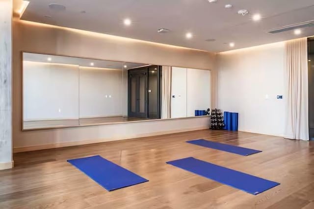 48 E Ave Unit 2707, Austin, TX 78701 - exercise area featuring wood finished floors