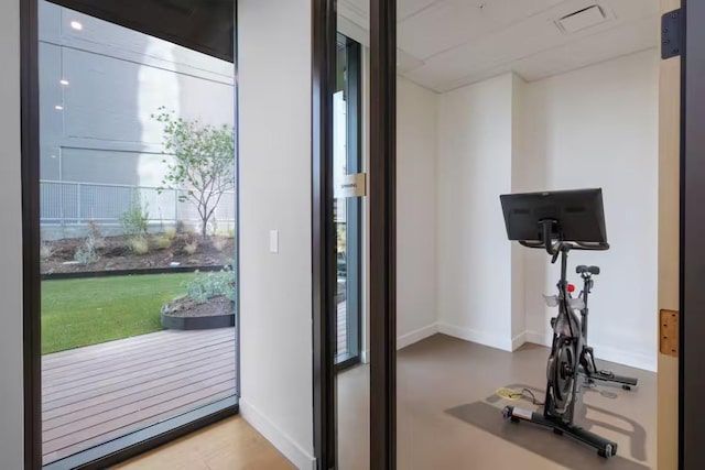 48 E Ave Unit 2707, Austin, TX 78701 - exercise room featuring baseboards