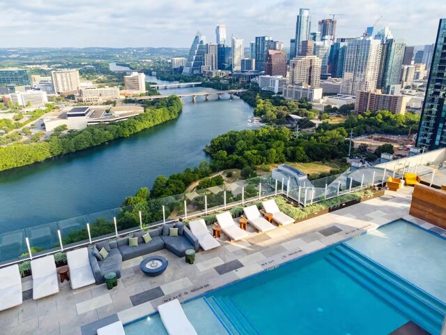 48 E Ave Unit 2707, Austin, TX 78701 - drone / aerial view of city skyline and a large body of water