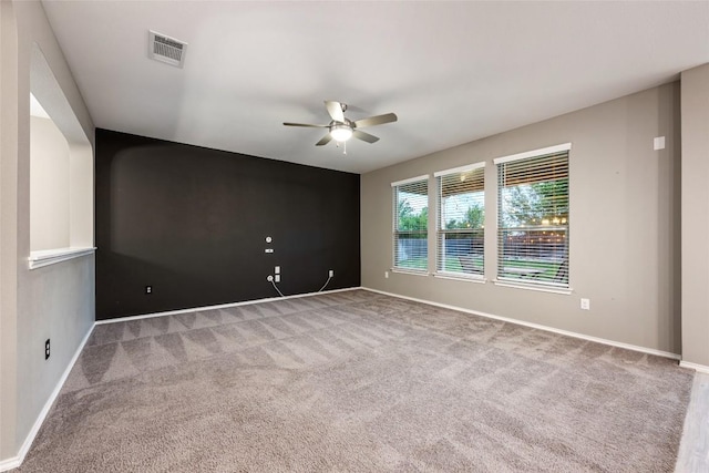 101 Crimson Ln, Kyle, TX 78640 - empty room featuring a ceiling fan and carpet floors