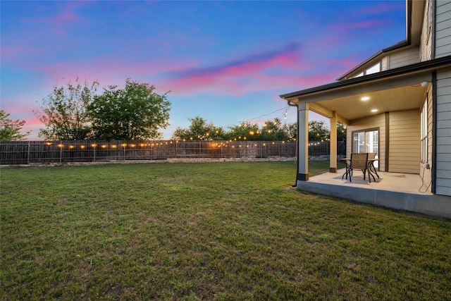 101 Crimson Ln, Kyle, TX 78640 - fenced backyard featuring a patio area