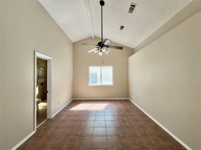 6400 Jennings Dr, Austin, TX 78727 - empty room with a textured ceiling, ceiling fan, and dark tile patterned flooring
