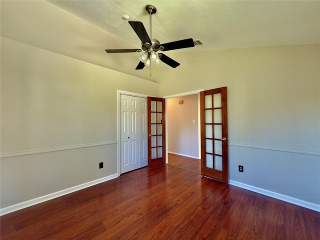 6400 Jennings Dr, Austin, TX 78727 - unfurnished room with french doors, wood finished floors, vaulted ceiling, and a ceiling fan