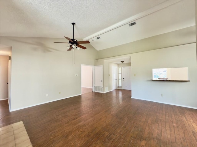 6400 Jennings Dr, Austin, TX 78727 - unfurnished living room with a ceiling fan, hardwood / wood-style floors, a textured ceiling, and high vaulted ceiling