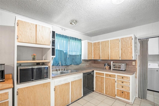 906 Lynn Ln, Copperas Cove, TX 76522 - kitchen with dishwasher, stainless steel microwave, washer / dryer, light tile patterned flooring, and a textured ceiling