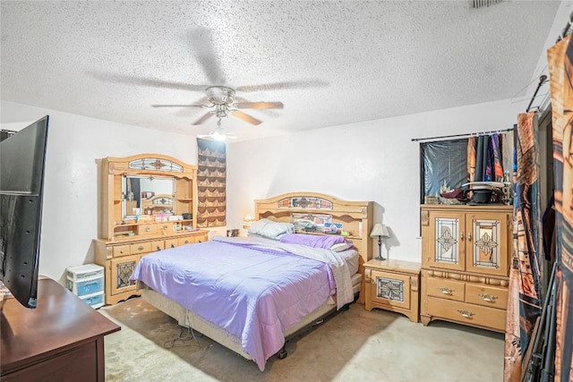 906 Lynn Ln, Copperas Cove, TX 76522 - bedroom with carpet, a textured ceiling, and ceiling fan