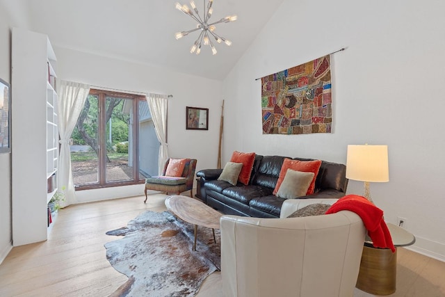 6302 Gato Path, Austin, TX 78731 - living area featuring a chandelier, wood finished floors, and high vaulted ceiling