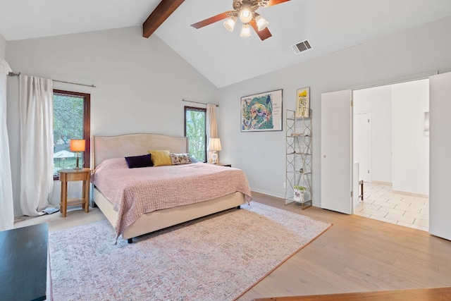 6302 Gato Path, Austin, TX 78731 - bedroom featuring beam ceiling, wood finished floors, high vaulted ceiling, and ceiling fan