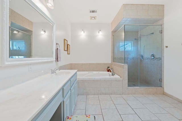 6302 Gato Path, Austin, TX 78731 - full bathroom featuring a garden tub, vanity, tile patterned flooring, and a stall shower