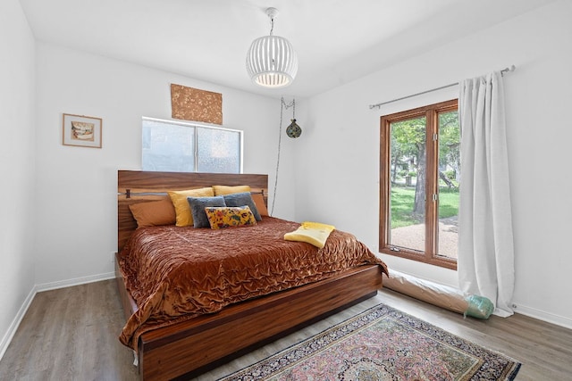 6302 Gato Path, Austin, TX 78731 - bedroom with wood finished floors and baseboards