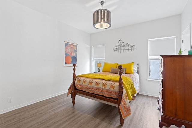 6302 Gato Path, Austin, TX 78731 - bedroom with wood finished floors and baseboards