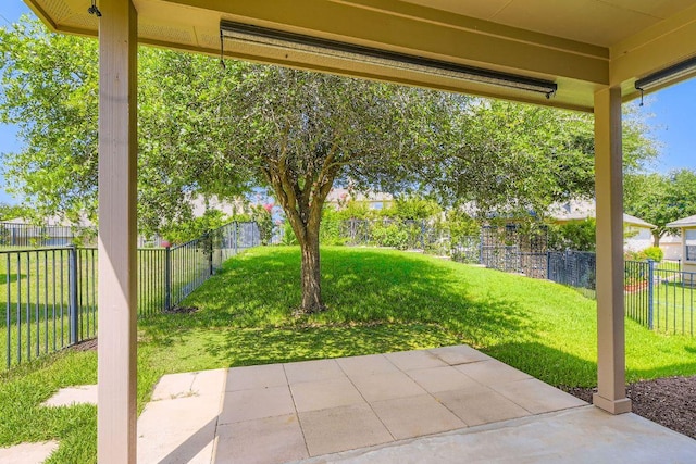 65 White Magnolia Cir, Lakeway, TX 78734 - fenced backyard with a patio area