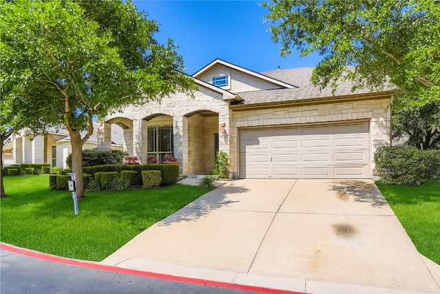 65 White Magnolia Cir, Lakeway, TX 78734 - traditional-style home with stone siding, a front lawn, driveway, a garage, and a shingled roof
