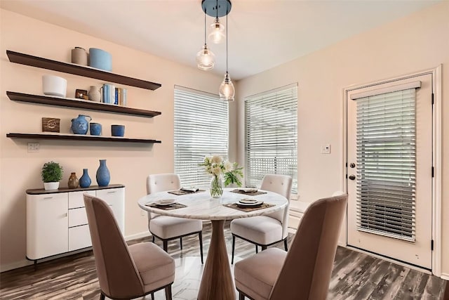 65 White Magnolia Cir, Lakeway, TX 78734 - dining space with dark wood finished floors and baseboards