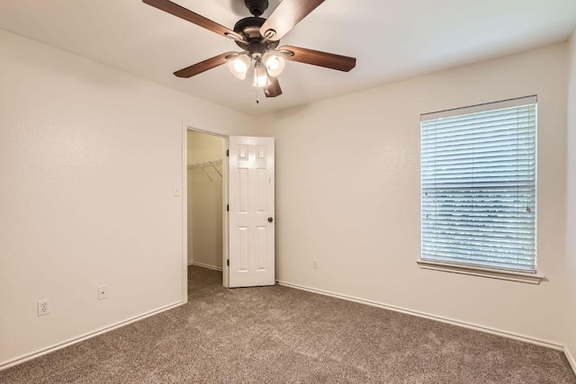 65 White Magnolia Cir, Lakeway, TX 78734 - empty room with carpet floors and a ceiling fan