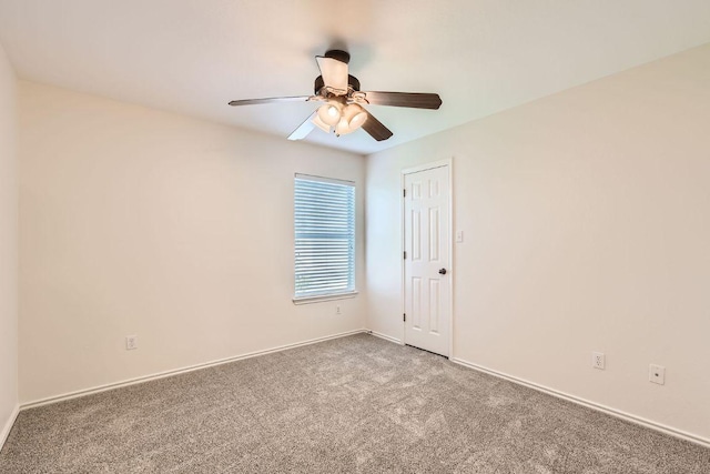 65 White Magnolia Cir, Lakeway, TX 78734 - carpeted spare room with ceiling fan and baseboards