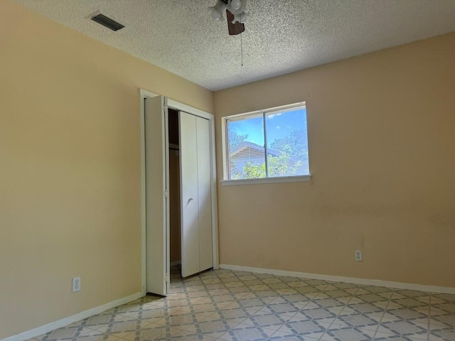 9705 Marlborough Dr, Austin, TX 78753 - unfurnished bedroom with a textured ceiling and a closet