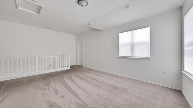 12416 Anthology St, Manor, TX 78653 - carpeted spare room with attic access