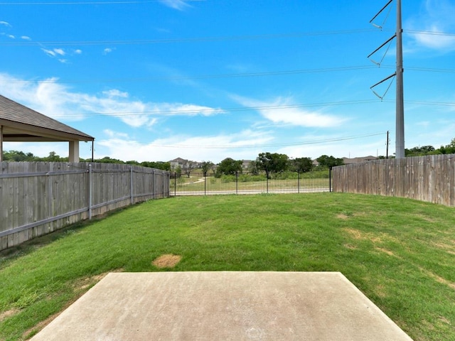 12416 Anthology St, Manor, TX 78653 - fenced backyard featuring a patio