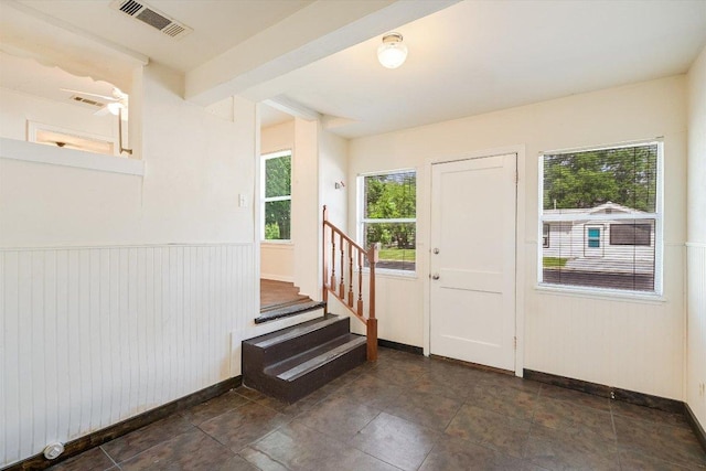 212 W 55th St, Austin, TX 78751 - foyer entrance with stairway and a wainscoted wall