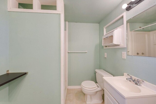 212 W 55th St, Austin, TX 78751 - full bath featuring a shower, vanity, and tile patterned flooring