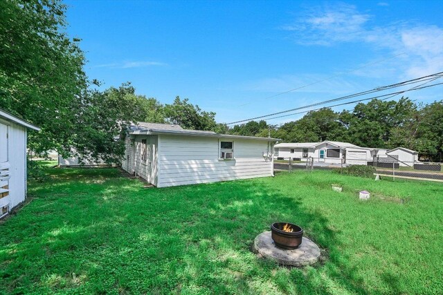 212 W 55th St, Austin, TX 78751 - view of yard with a fire pit