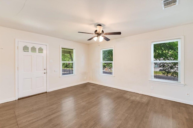 212 W 55th St, Austin, TX 78751 - unfurnished room featuring wood finished floors and a ceiling fan