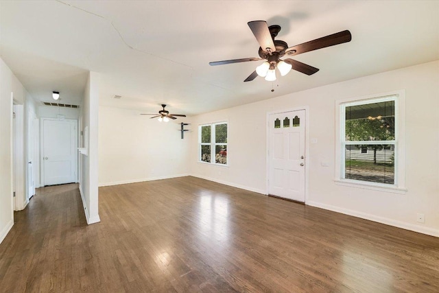 212 W 55th St, Austin, TX 78751 - unfurnished living room featuring dark wood finished floors and ceiling fan