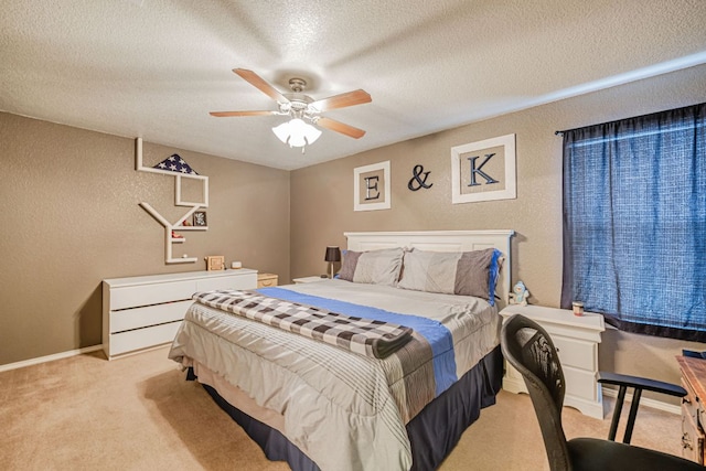 4735 Stonehaven Dr, Temple, TX 76502 - bedroom with light colored carpet, a textured ceiling, a textured wall, and a ceiling fan