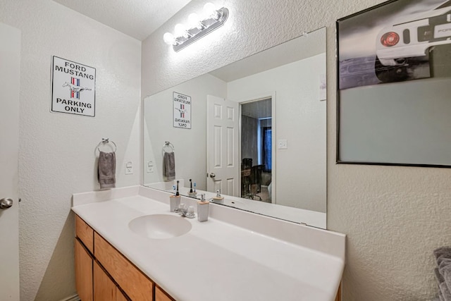 4735 Stonehaven Dr, Temple, TX 76502 - bathroom with a textured wall and vanity
