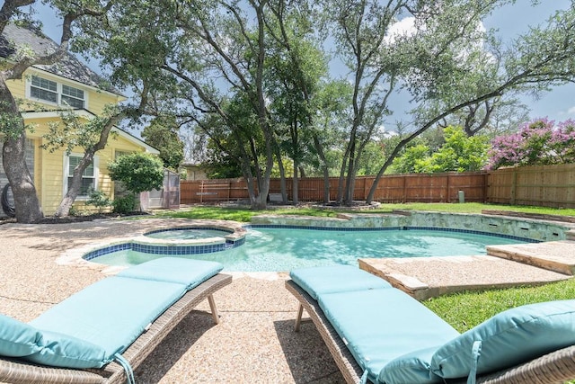 208 Norwood Cv, Georgetown, TX 78628 - view of pool with an in-ground hot tub and a fenced backyard