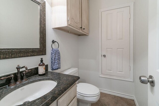 208 Norwood Cv, Georgetown, TX 78628 - half bathroom featuring vanity and tile patterned floors