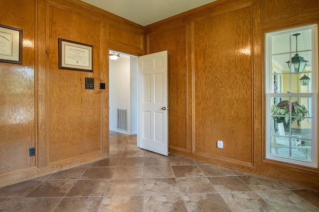 208 Norwood Cv, Georgetown, TX 78628 - empty room with wooden walls and baseboards
