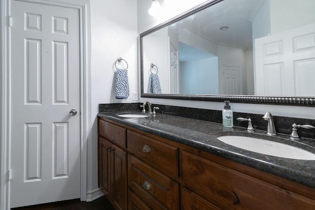 208 Norwood Cv, Georgetown, TX 78628 - full bath with double vanity and ornamental molding