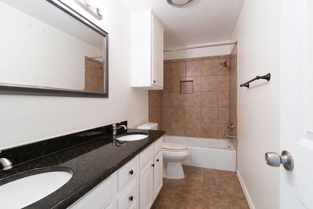 208 Norwood Cv, Georgetown, TX 78628 - bathroom featuring double vanity, washtub / shower combination, and tile patterned floors