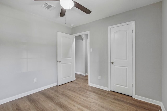 1326 Amy Dr, Kyle, TX 78640 - unfurnished bedroom with wood finished floors and ceiling fan