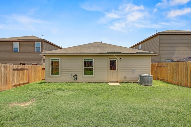 1326 Amy Dr, Kyle, TX 78640 - rear view of house with a fenced backyard and a shingled roof