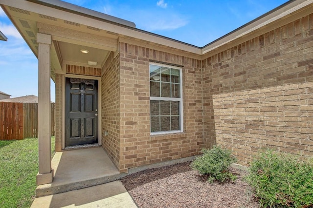 1326 Amy Dr, Kyle, TX 78640 - doorway to property with brick siding