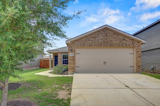 1326 Amy Dr, Kyle, TX 78640 - single story home featuring brick siding and concrete driveway