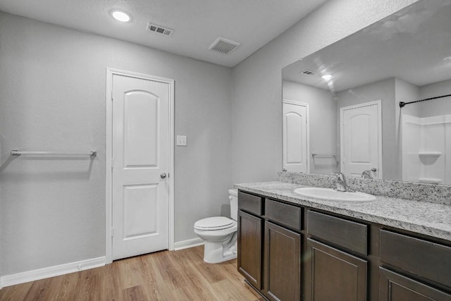 1326 Amy Dr, Kyle, TX 78640 - full bath with vanity, wood finished floors, and a shower