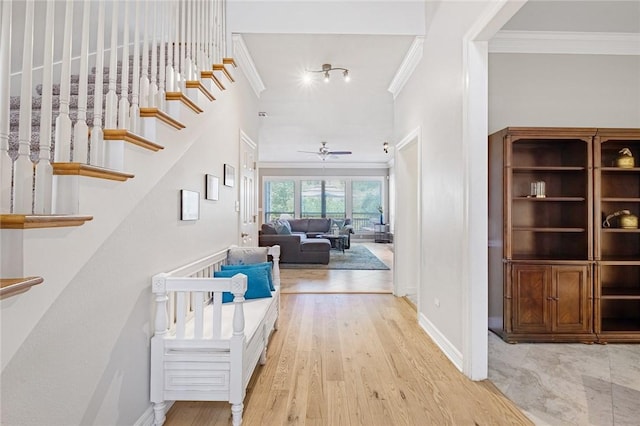 1733 Canonero Dr, Austin, TX 78746 - hall featuring ornamental molding, stairs, wood finished floors, and a high ceiling