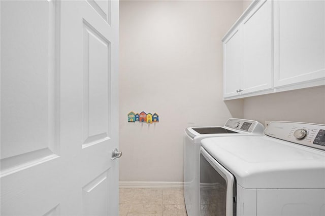 1733 Canonero Dr, Austin, TX 78746 - washroom with washer and clothes dryer and cabinet space